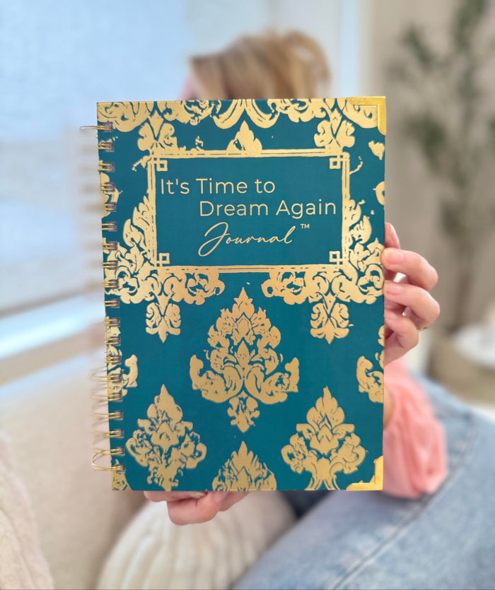 Close-up of the teal and gold foil journal cover
